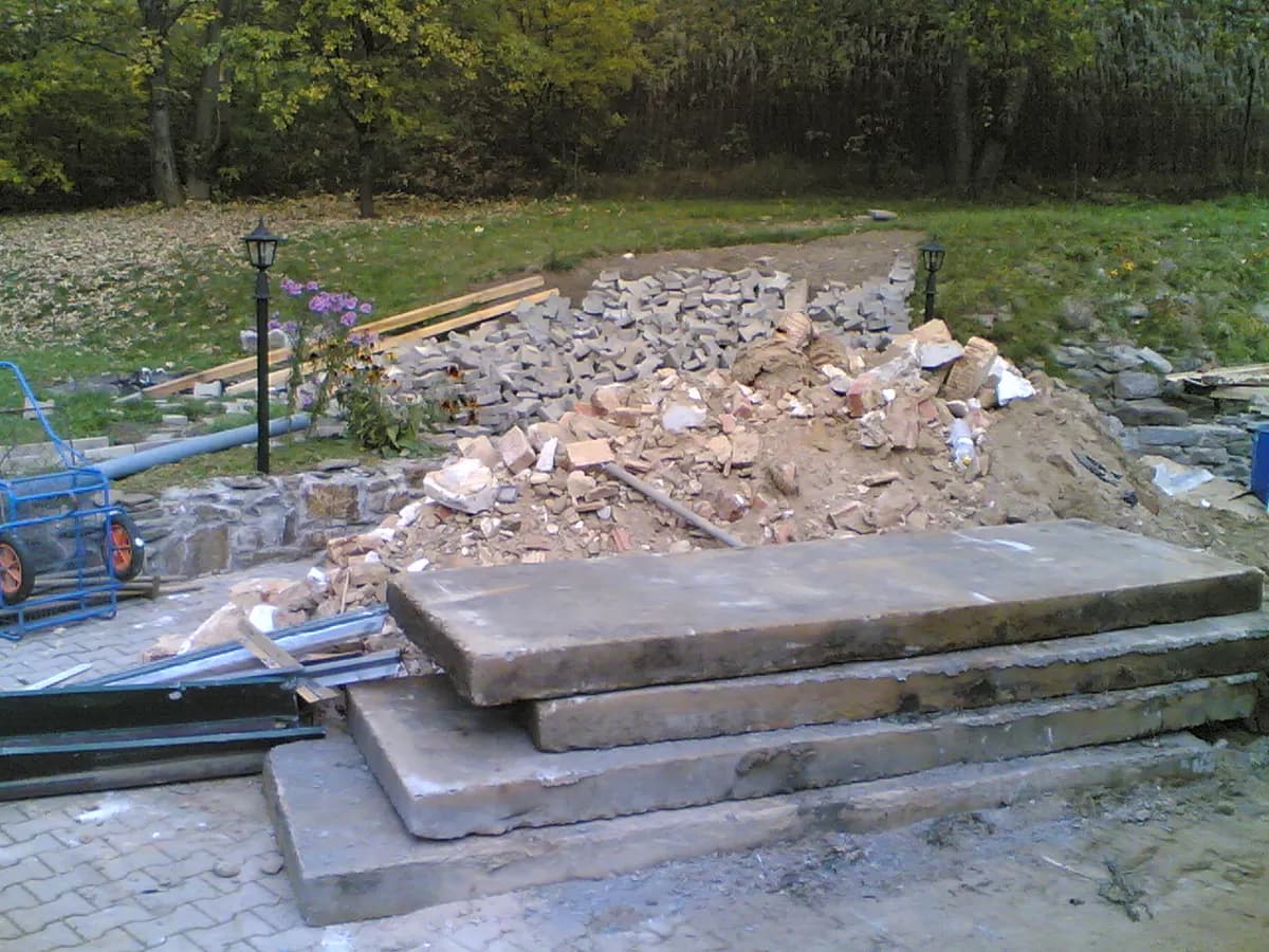 Concrete slabs and demolition debris piled on site