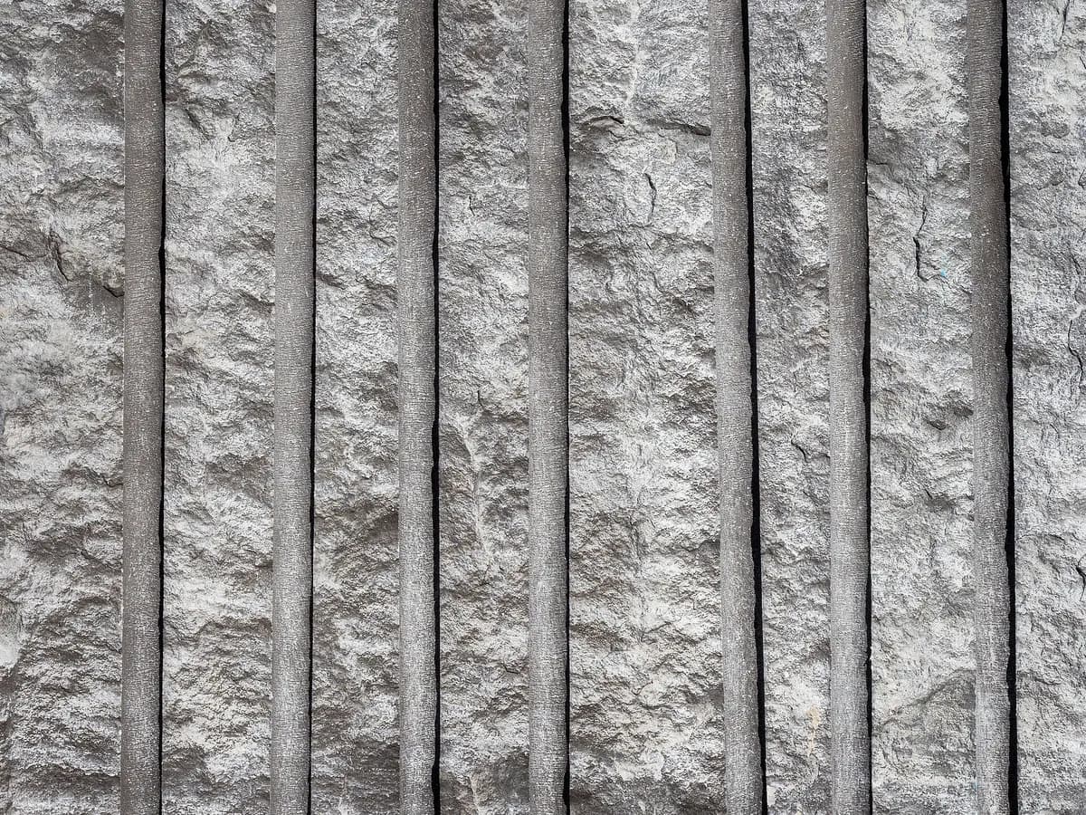 Quarry rock face with drill hole marks