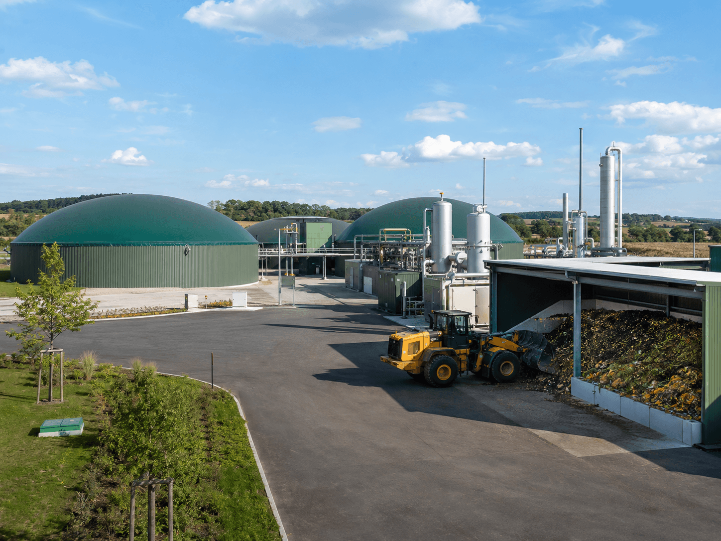 Loader feeding waste at a food waste biogas plant